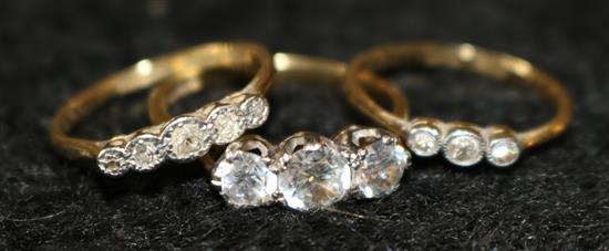 2 x 18ct gold and diamond rings and an 18ct gold simulated 3 stone diamond ring